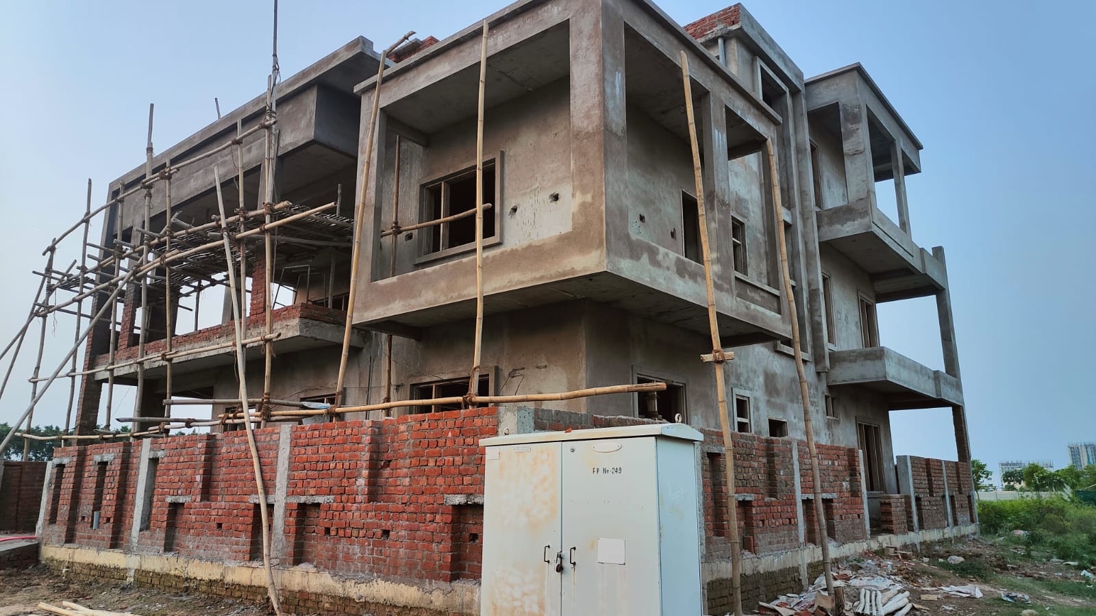 Multi-story building under construction showing concrete structure